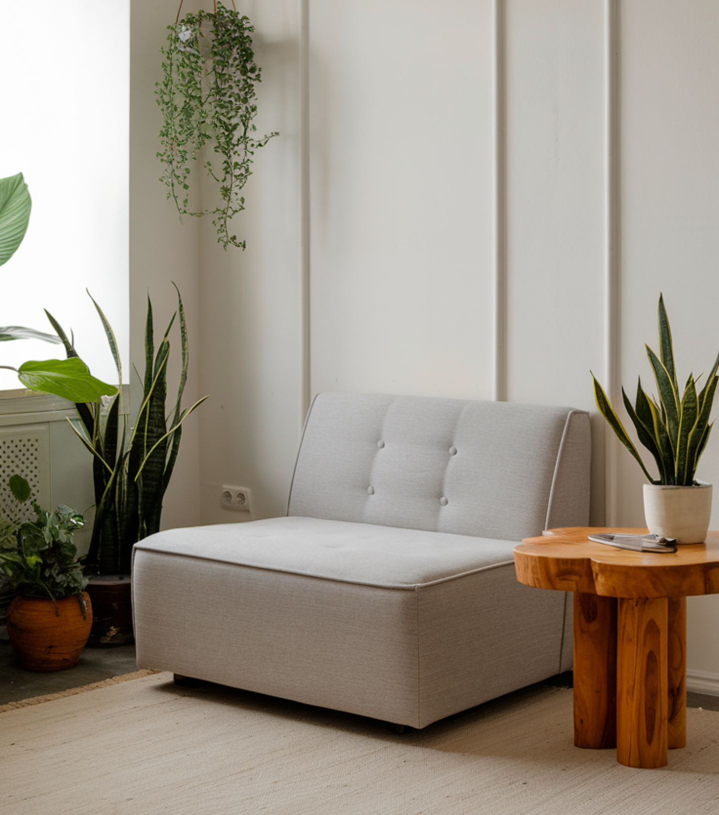 Gray backrest sofa and wooden coffee table