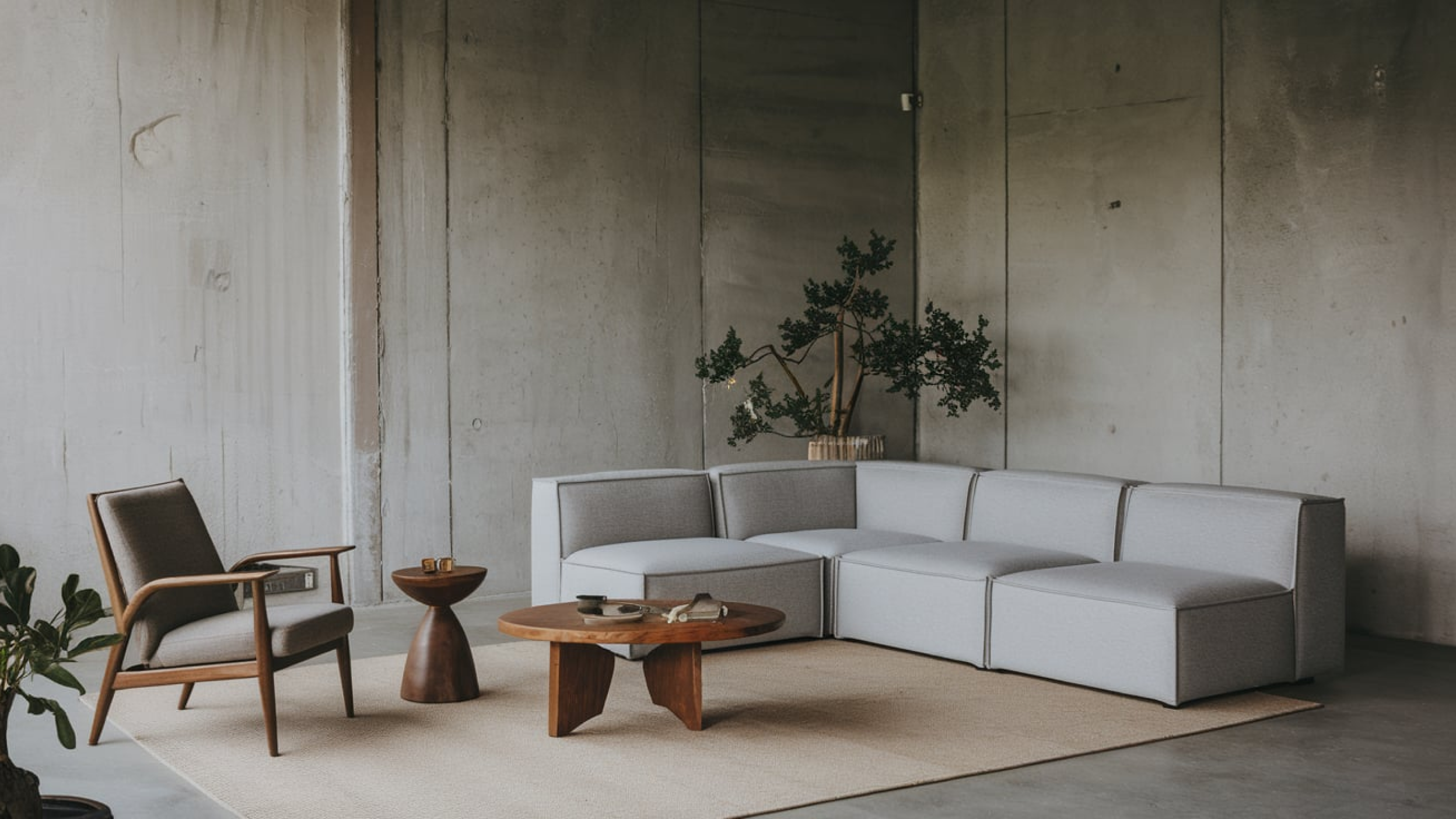 Living room with brown armchair and gray corner sofa