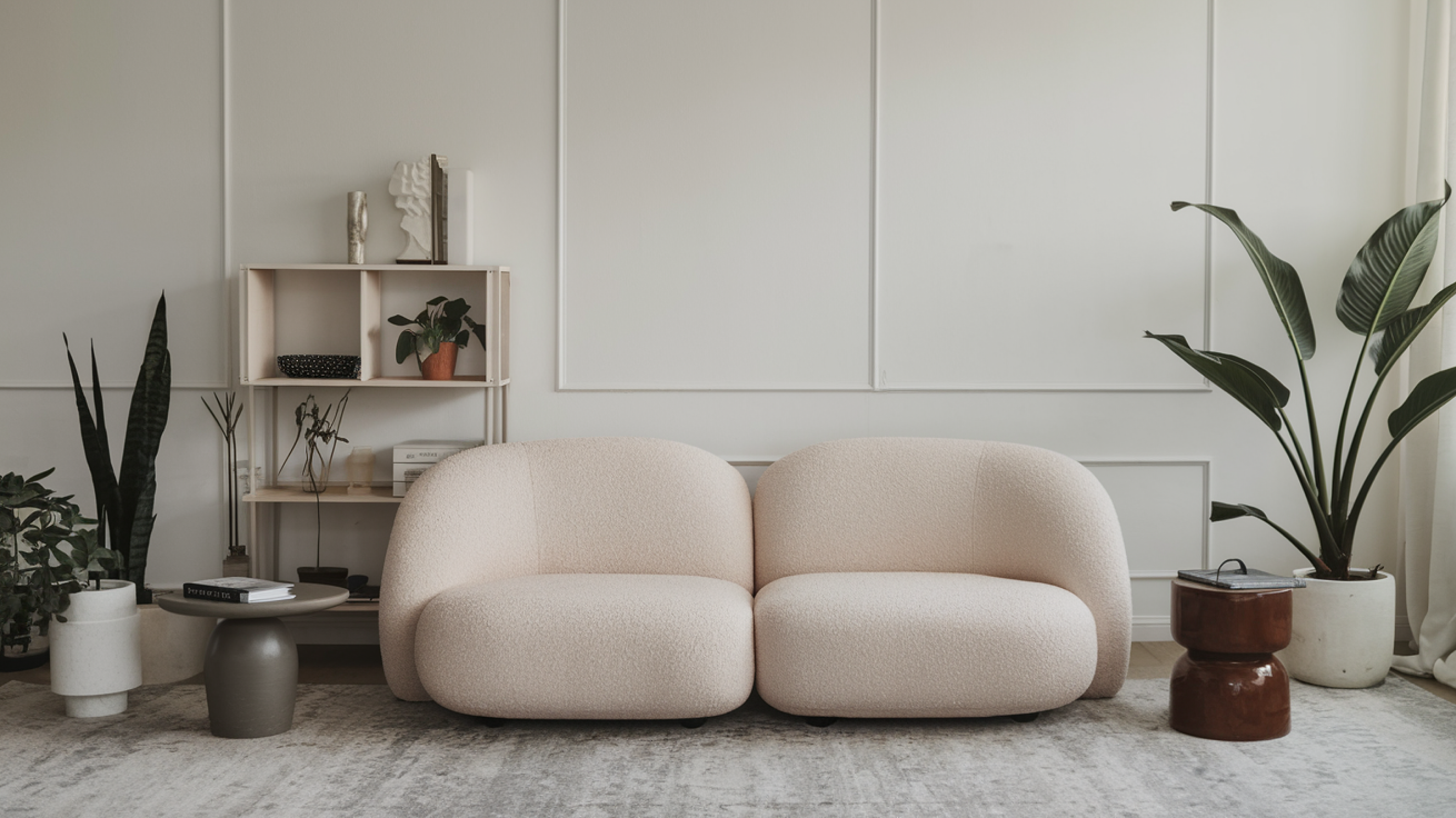 Living room with gray two-seater puffy sofa